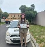West Coast Driving School student after a lesson milestone